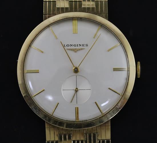 A gentlemans early 1960s 9ct gold Longines manual wind wrist watch, on a 9ct gold Longines bracelet, in Longines box.